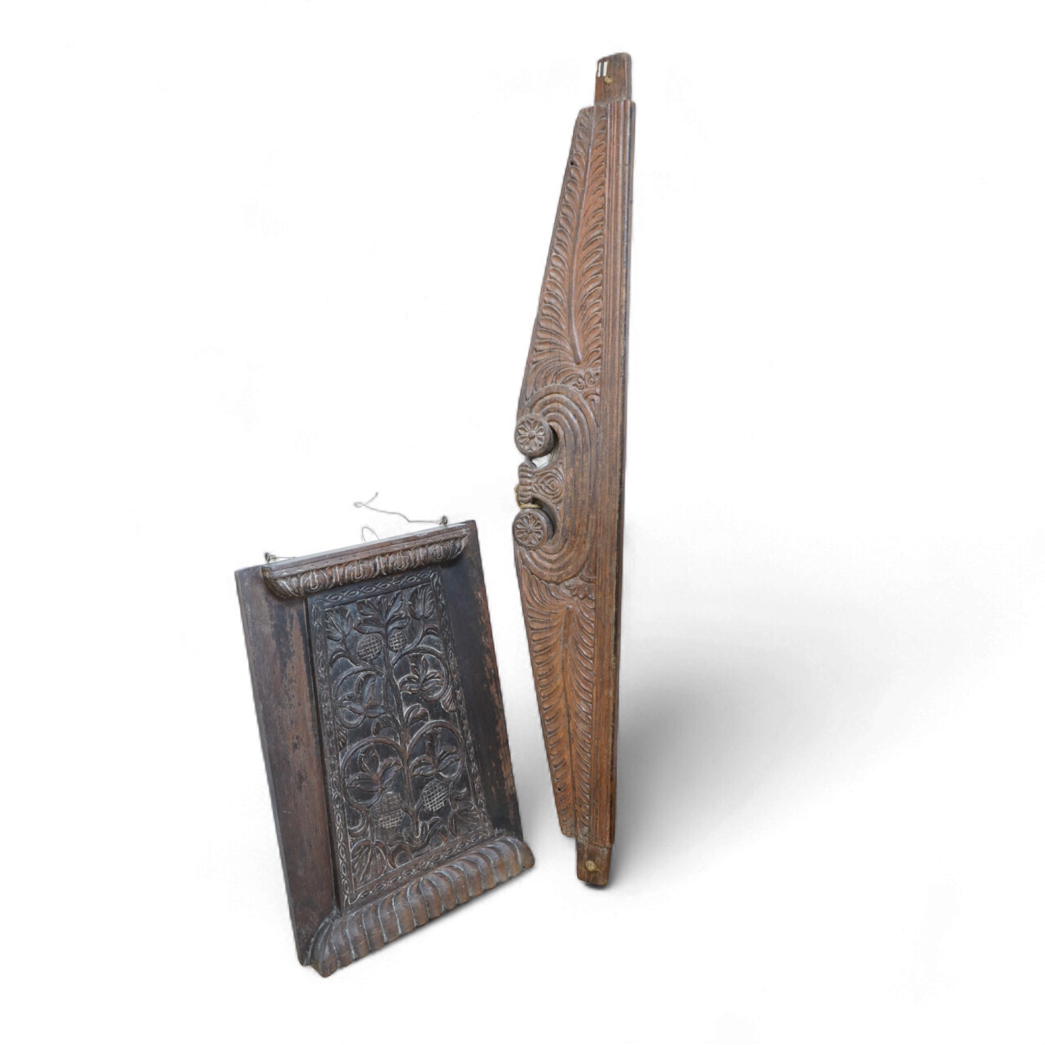 An Anglo-Indian carved wood crest and a similar door portico, latter 127cm in length